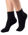 Women's black cotton quarter socks featuring a soft knitted texture, ribbed cuffs, and a comfortable fit for everyday wear.