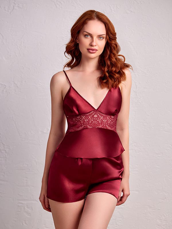 A photo of a beautiful satin babydoll top with a V-neck under the chest matching with satin short 